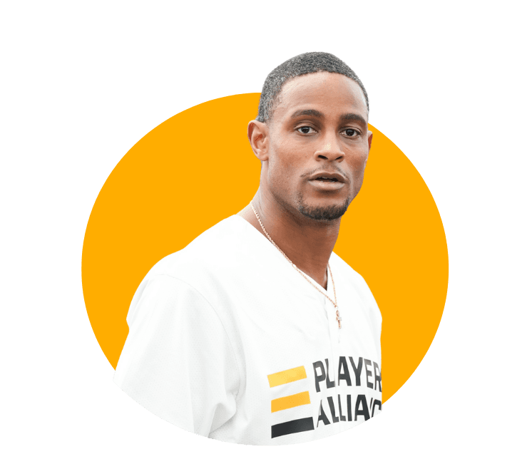 Smiling woman giving a piggyback ride to a laughing young girl.